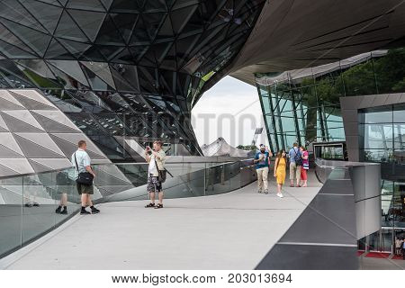 Munich, Germany - August 3, 2017: Exterior shot of BMW Welt in Munich. It is a multi-use exhibition center used for meetings and promotional events. Designed by archtectural firm Coop Himmelblau