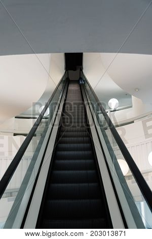 Munich, Germany - August 3, 2017: Interior view of main staircase of BMW Museum in Munich. It was designed by archtectural firm Coop Himmelblau