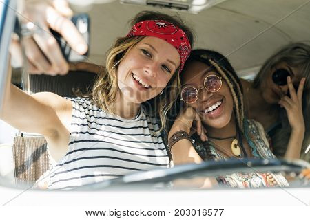 Group of Diverse Friends on Road Trip Taking Selfie Together