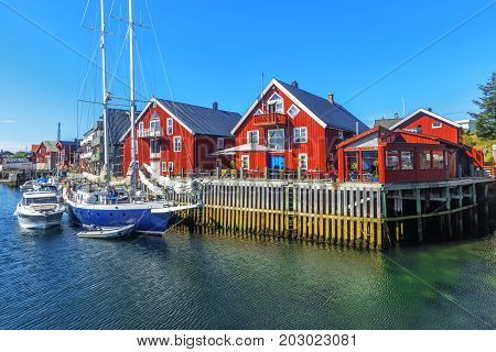 Scenic View Of Colorful Wooden Buildings In Henningsvaer In Summer.