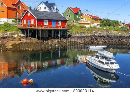 Scenic View Of Colorful Wooden Buildings In Henningsvaer In Summer.