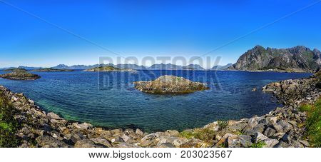 Scenic View Of The Waterfront Harbor In Henningsvaer In Summer.