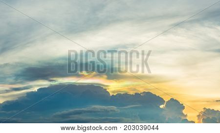 Fiery cloudy sky It's expose rainbow cloudy in the sky at twilight time.