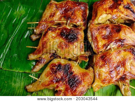 Grilled Chicken On Banana Leaves At Rural Market