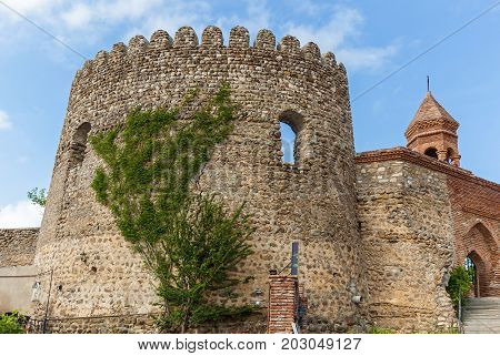 Old city wall from stones with towers round a city Sighnaghi. Kakheti. Georgia. It is City of Love in Georgia.