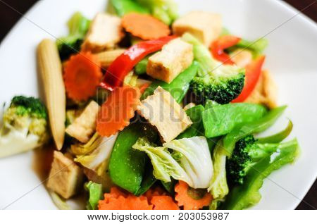 Stir-Fried Mixed Vegetables, Stir-fried broccoli, baby corn, carrots, peapods, napa and bell pepper in a soy sauce