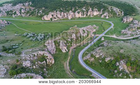 mountain landscape with some of the oldest limestone rock formations in Europe in Dobrogea Gorges (Cheile Dobrogei) Romania