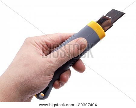 Fotografia a colori di costruzione di un coltello nella mano di un uomo