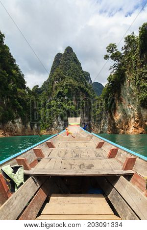 Point of view of Cheow Lan lake from long tail boat at Khao Sok National Park in Thailand