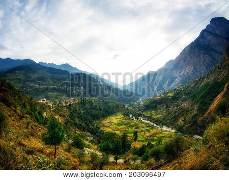 Himalayan village general view from road in Parvati Valley, Himachal Pradesh