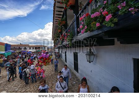July 16 2017 Villa de Leyva Colombia: the large cobblestone plaza is filled up with vendors and visitors during the annual fiesta