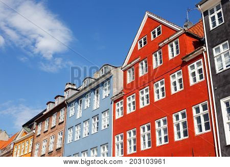 Colorful facades of buildings in Nyhavn Copenhagen Denmark.