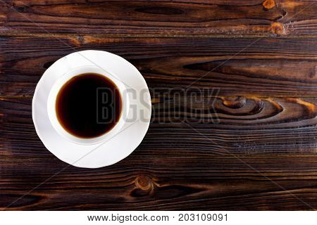 coffee cup on Wooden Table White Cup on wooden background