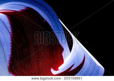 Canada Flag lightpainted on black background texture