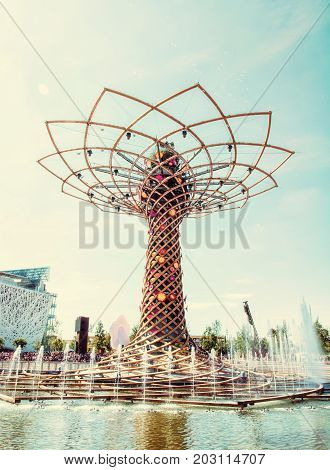 Tree of life at exhibition Expo Milano 2015 Italy. The masterpiece to the world. Artistic object. Retro photo filter. Vertical composition.