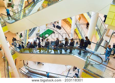 People Escalator In Shopping Mall