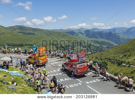 Col de PeyresourdeFrance- July 23 2014: Haribo vehicles passing in the Publicity Caravn on the road to Col de Peyresourde in Pyrenees Mountains during the stage 17 of Le Tour de France 2014.