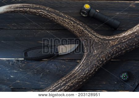 Hunting Knife With A Flashlight And A Compass.