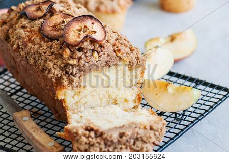 Holland Apple Crumble Bread Served On A Wire Rack On A White Stone Background. Close Up And Copy Spa