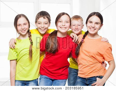 Happy group teens in school. Smiling teen. Frendship boys and girls