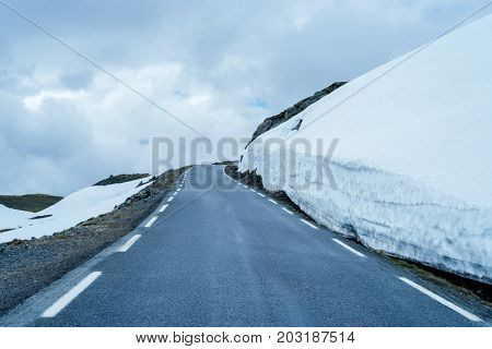 Norwegian Tourist Route Aurlandsfjellet runs from Aurlandsvangen to Laerdalsoyri. Snowy road Bjorgavegen