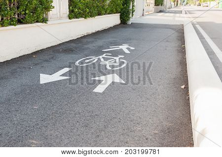 Bicycle road sign and arrow. A bike lane for cyclist.