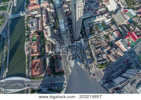 High modern building and office area in big city, top view at sunny day in Tianjin, China