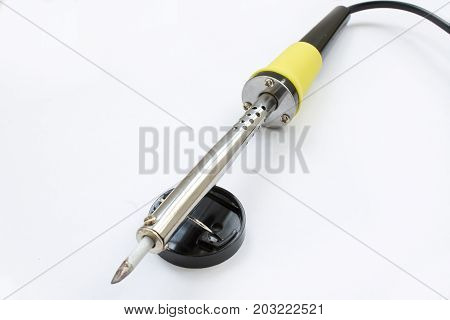 Soldering iron on white background. closeup shot