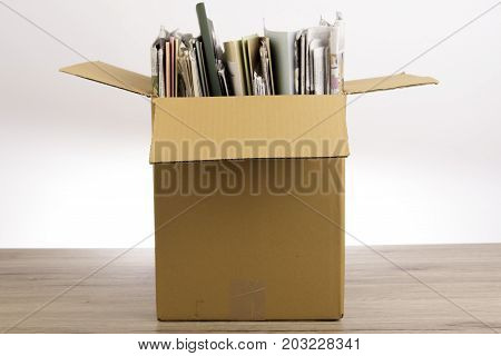 Documents File in the Brown box in office