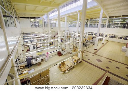 MOSCOW - SEP 15, 2016: People in workshop of cosmetics factory Freedom was created on basis of first in Russia perfume factory Rally and Co, which was founded in 1843