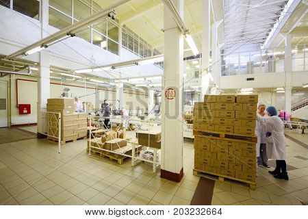 MOSCOW - SEP 15, 2016: People in workshop of soap and cosmetics factory Freedom was created on basis of first in Russia perfume factory Rally and Co, which was founded in 1843