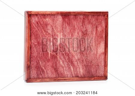 A close-up picture of a wine-colored wooden box isolated on a white background. Closed empty container. A device for delivering of small items. Cargo delivering. Business concept. Copy space.