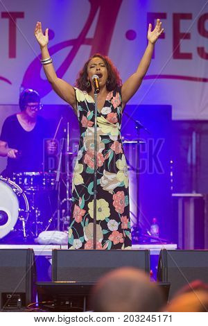 Minsk Belarus-August 12 2017: Vocalist and Singer Pat Appleton of World Renowned Jazz Ensemble De-Phazz Performing at A-Fest Music Festival on August 12 2017 in Minsk Republic of Belarus.