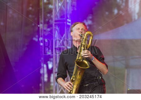 Minsk Belarus-August 12 2017: Saxofonist Marcus Bartelt of World Renowned Jazz Ensemble De-Phazz Performing at A-Fest Music Festival on August 12 2017 in Minsk Republic of Belarus.