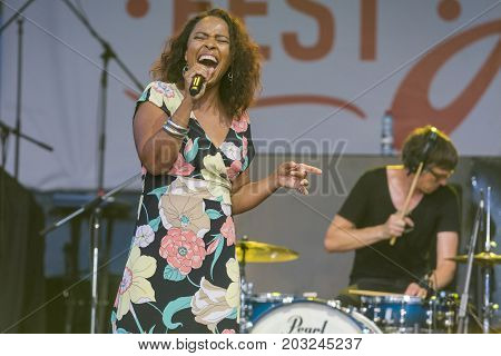Minsk Belarus-August 12 2017: Vocalist and Singer Pat Appleton of World Renowned Jazz Ensemble De-Phazz Performing at A-Fest Music Festival on August 12 2017 in Minsk Republic of Belarus.