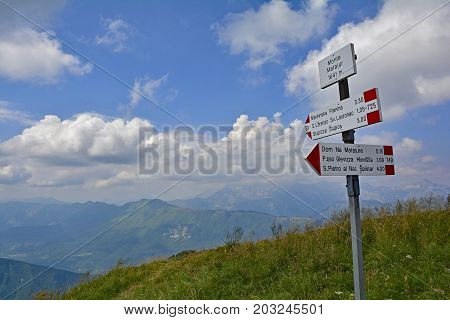 A signpost on the peak of the Matajur mountain in Friuli Venezia Giulia north east Italy