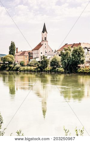 Saint Gertraud church in Passau Germany. Cultural heritage. Retro photo filter. Architectural theme.