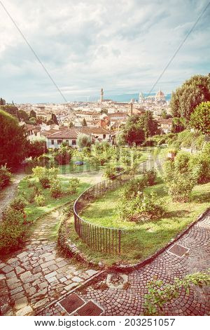 View from Giardino delle Rose to the city of Florence. Tuscany Italy. Yellow photo filter. Beautiful travelling scene.