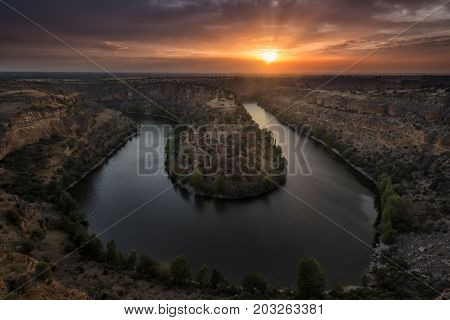 Warm sunset over Hoces del Duraton river