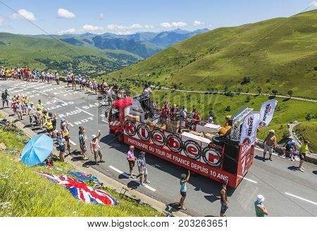 Col de PeyresourdeFrance- July 23 2014: Kleber vehicle passing in the Publicity Caravn on the road to Col de Peyresourde in Pyrenees Mountains during the stage 17 of Le Tour de France 2014.