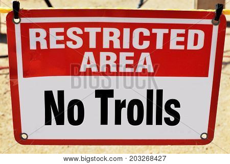 Restricted area no trolls sign allowed ever..