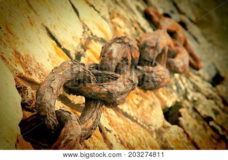 Anchor chain of a vessel on a mooring selective focus