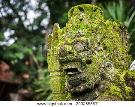 Rakasa Balinese Stone Sculpture Covered With Moss.