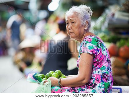HO CHI MINH CITY (SAIGON), VIETNAM - JULY 2017 : Unidentified vendrs at Ben Thanh market in Saigon, Ho Chi Minh City, Vietnam