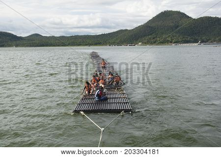 September 04, 2017 : Tourists Floating On The River By Wooden Raft In Srinakarin Dam, Kanchanaburi,