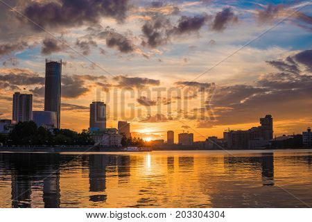 Yekaterinburg City Center On Sunset. City Pond View, Amazing Clouds And Sky. High Buildings, Skyscra