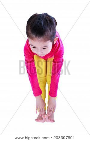 Full body of asian pretty child stretched bending down before doing yoga exercise. Healthy chinese girl warming up at studio. Sports and active lifestyle. Isolated on white background.