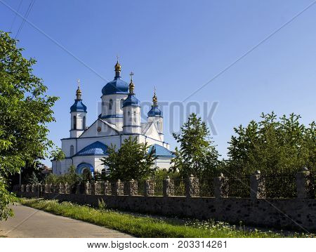 Church religion building cross white architecture sky country rural chapel.