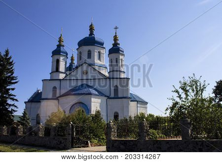 Church religion building cross white architecture sky country rural chapel.