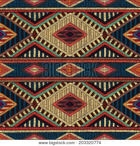 Embroidered seamless geometric pattern. Ornament for the carpet. Ethnic and tribal motifs. Colorful print of handmade. Vector illustration.